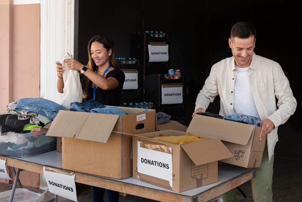 volunteers sorting clothing donations community services of venango county 